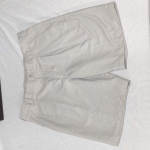 Men's size 36 Nike Golf Dri-Fit khaki shorts. 9 inch inseam